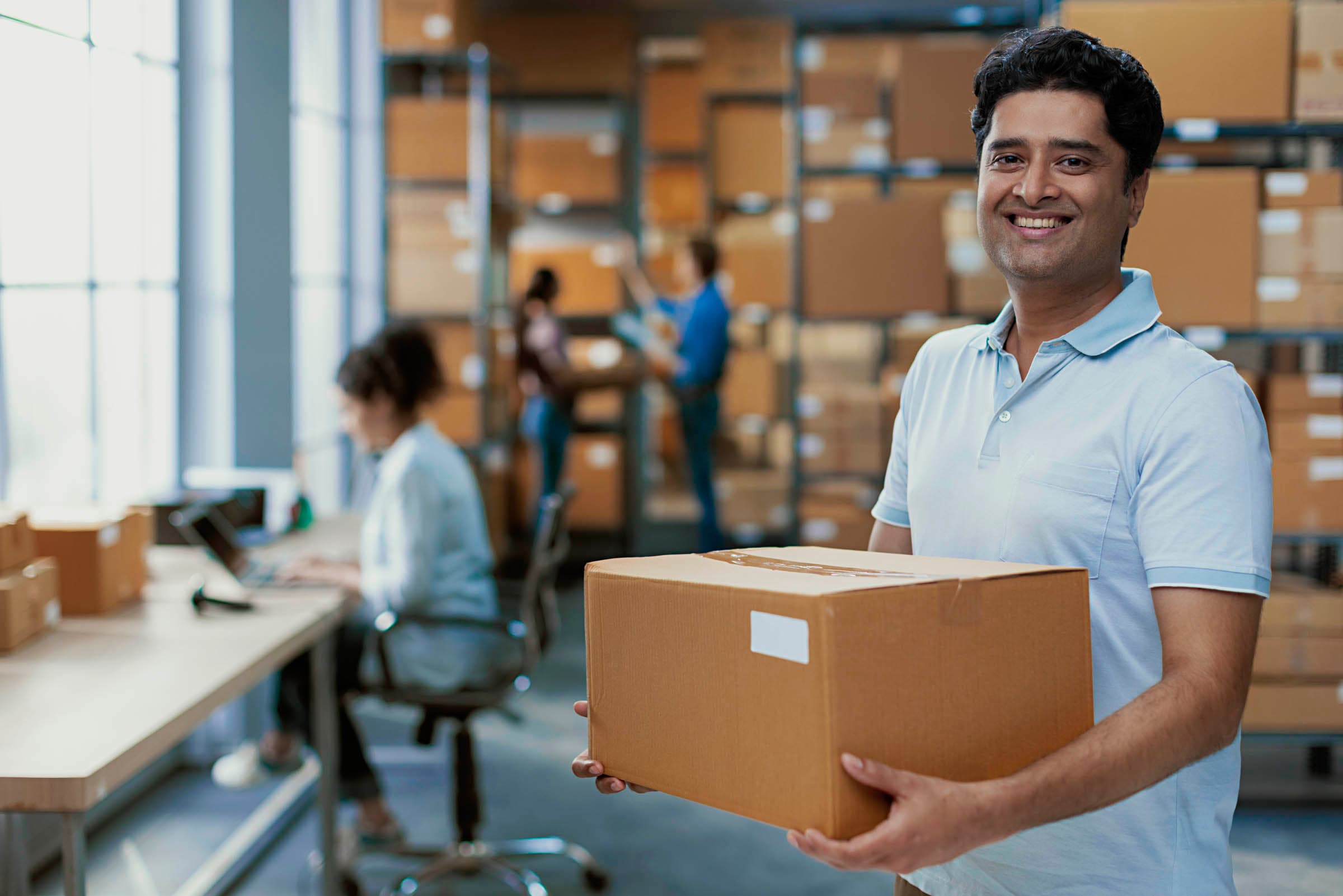 Paperfly fulfilment team preparing merchant parcels